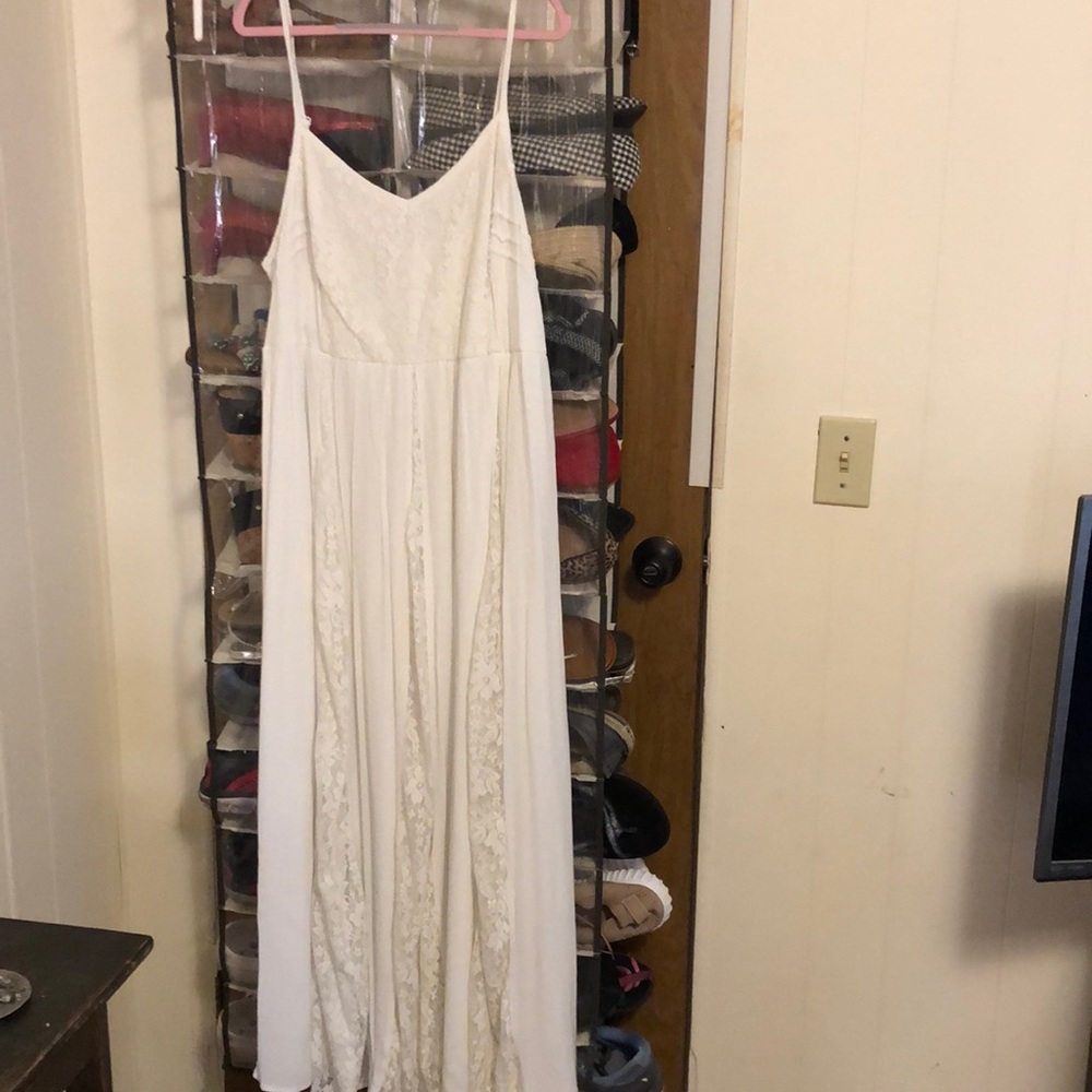 Long white dress with lots of lace details